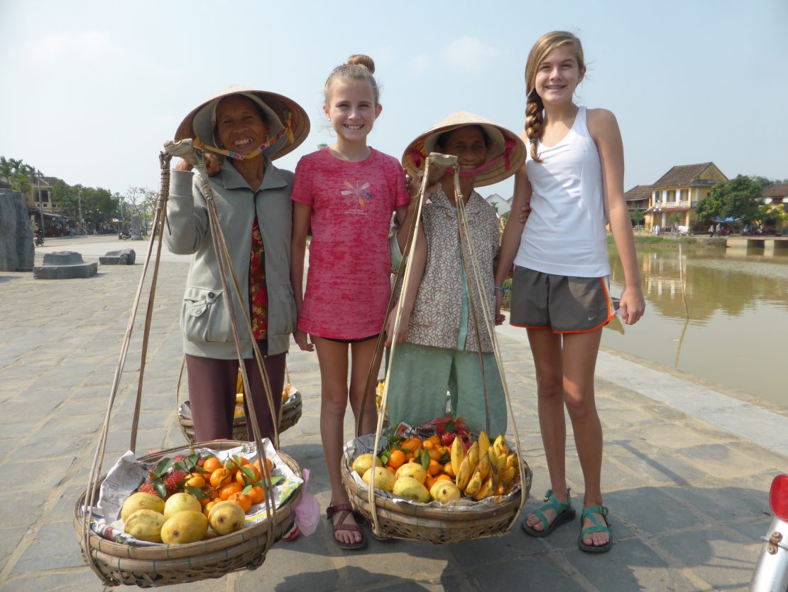 cultural differences Two American girls with two Vietnamese women in Hoi An