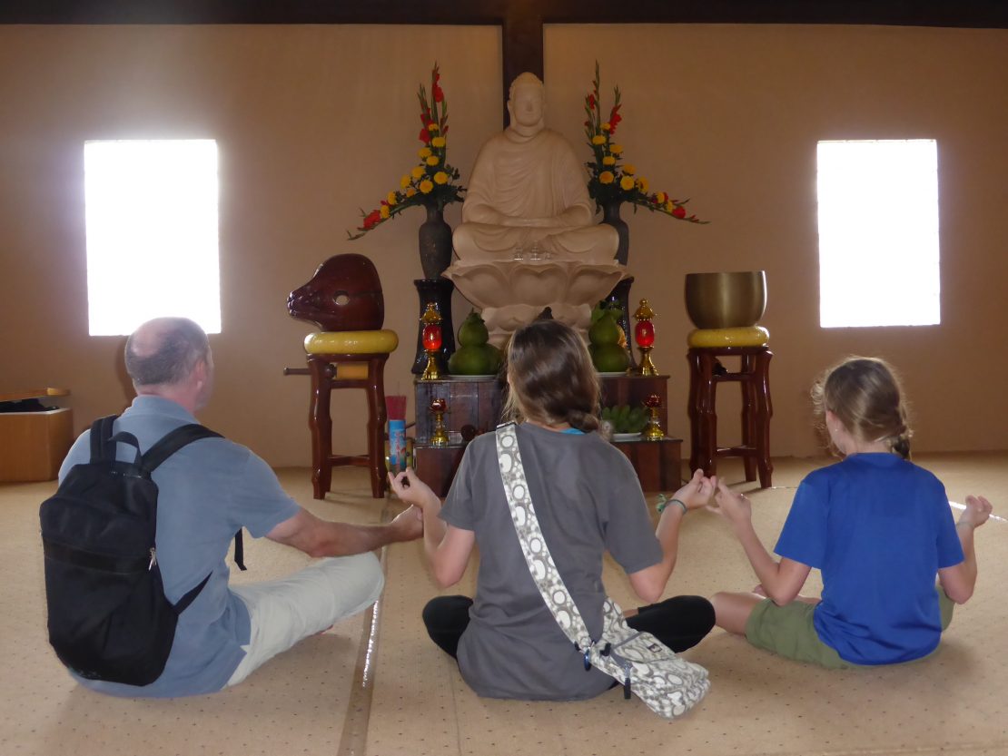 Family meditates at Truc Lam