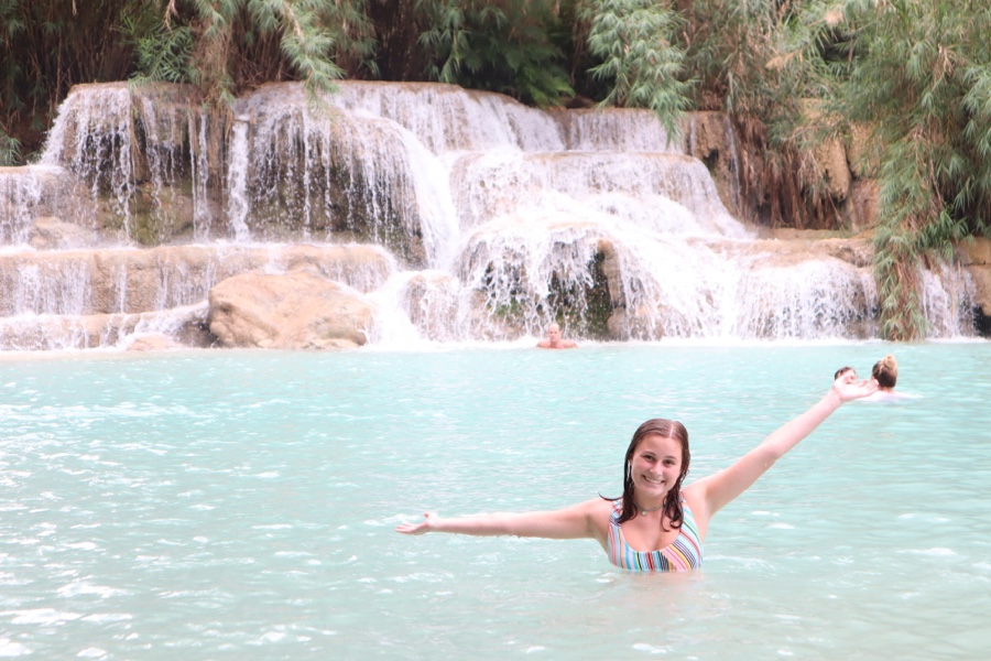 Kuang Si waterfall with teen