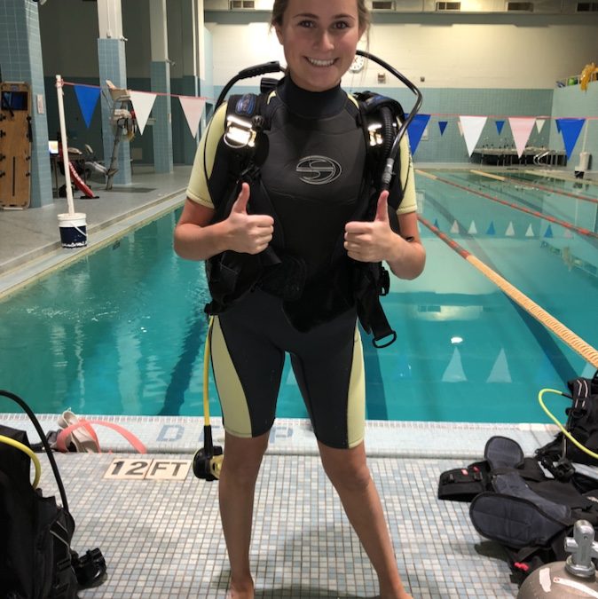 Riley in pool practicing scuba skills