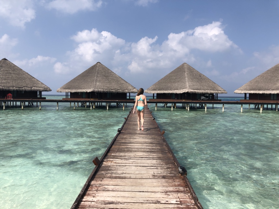 Boardwalk to overwater bunglows Maldives