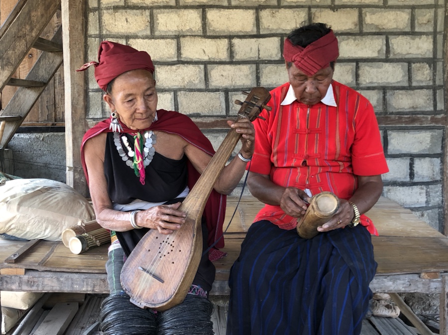 Hta Nee La Leh village musicians Daw Soe Myar and U Mi Reh play their handmade instruments. The duo have 7 children and 30 grandchildren.